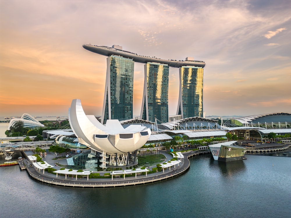 a large body of water with a bunch of tall buildings in the background