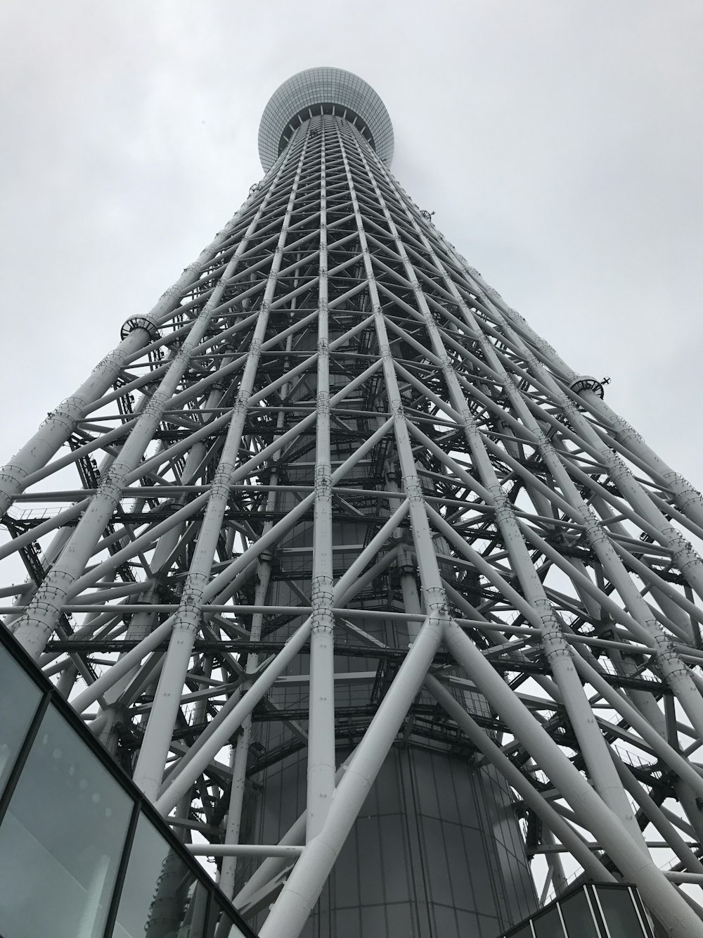 a tall metal structure with a sky background