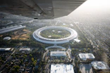 an aerial view of a circular building in a city