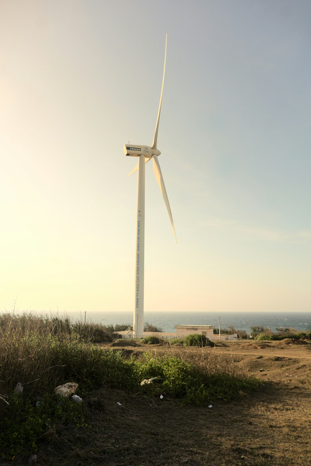 a wind turbine in the middle of a field