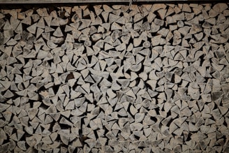 A close-up of sturdy fireproof wall panels stacked neatly in a warehouse, showcasing their texture and durability.