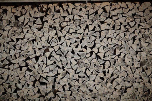 A close-up of sturdy fireproof wall panels stacked neatly in a warehouse, showcasing their texture and durability.