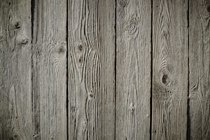 Rustic reclaimed wood flooring with rich textures and knots