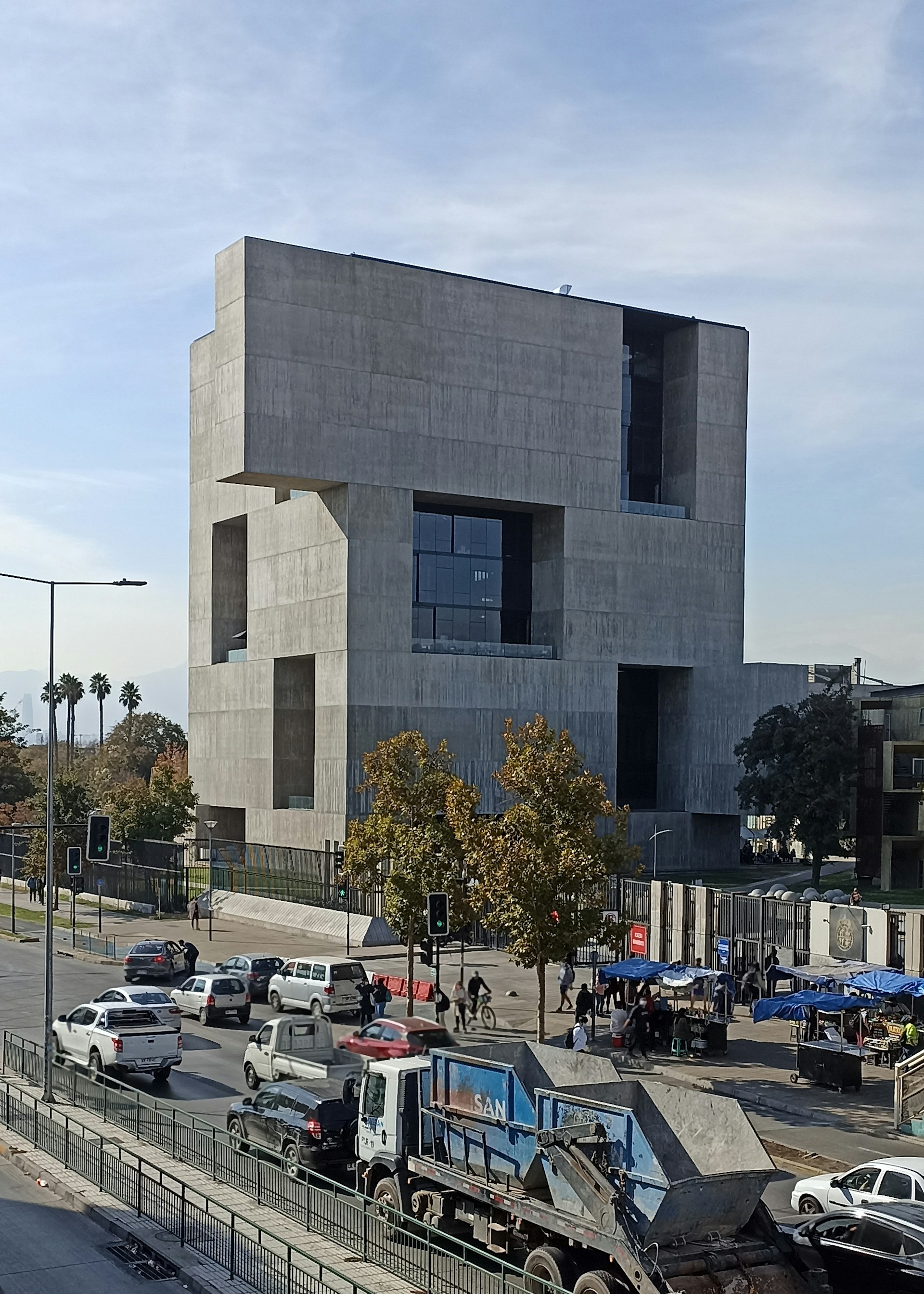 woman wearing yellow long-sleeved dress under white clouds and blue sky during daytime