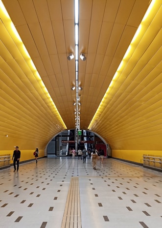 a couple of people that are standing in a room