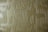 A textured surface featuring a geometric pattern of vertical and horizontal lines in a relief style. The pattern creates a three-dimensional effect with shadows enhancing the depth.