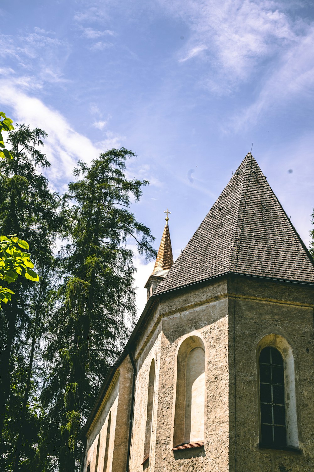 a church with a steeple and a clock tower