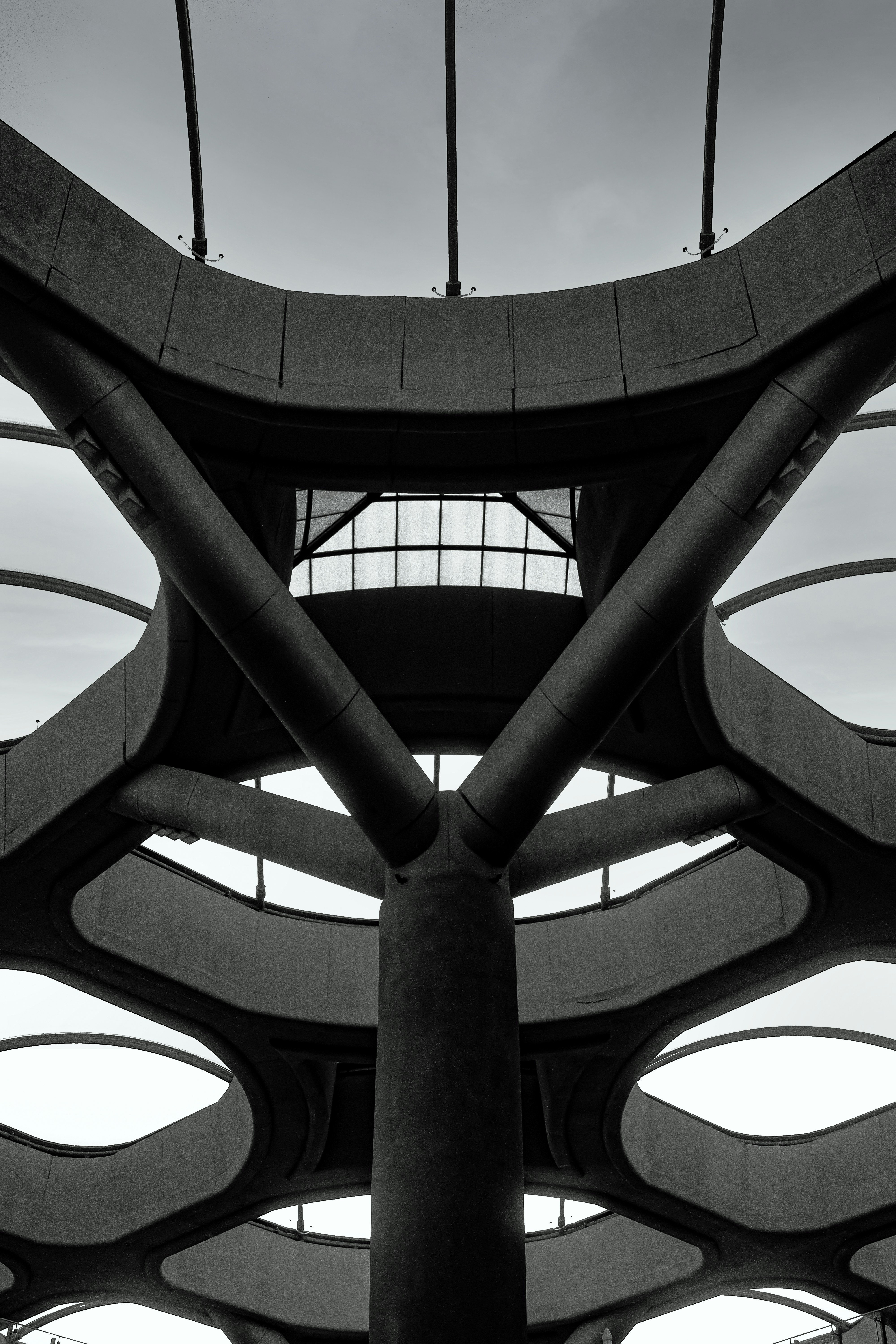 a black and white photo of a large structure