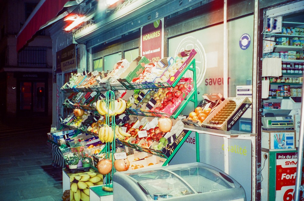 a grocery store with a display of fruits and vegetables