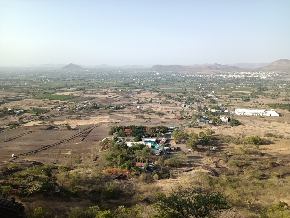 an aerial view of a small town in the desert