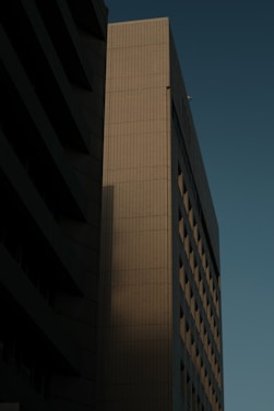 a tall building with a clock on the side of it