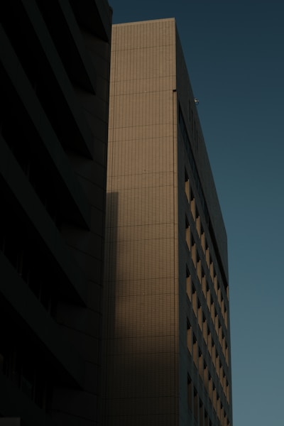 a tall building with a clock on the side of it