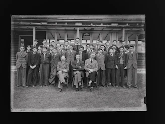 Group photo of the faculty team during a campus event.