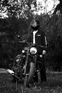 A model showcasing premium motorcycle apparel against a scenic backdrop.