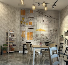 A cozy, stylish room showcasing a wall with vibrant CNC printed mural art.