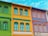 A close-up of a freshly painted facade showcasing vibrant colors and clean lines.