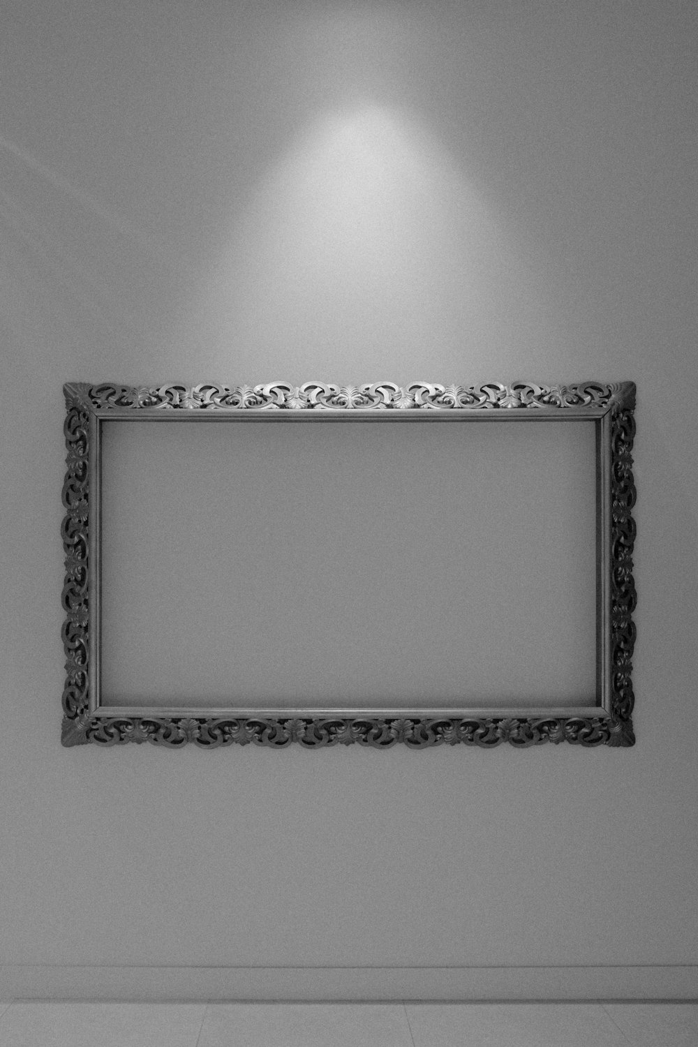 a black and white photo of a picture frame