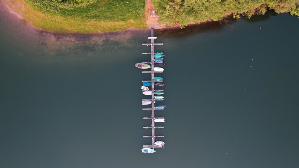 an aerial view of boats docked at a dock