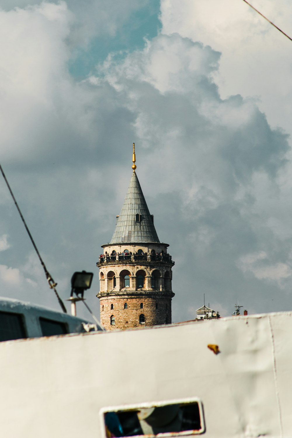 a tall tower with a clock on the top of it