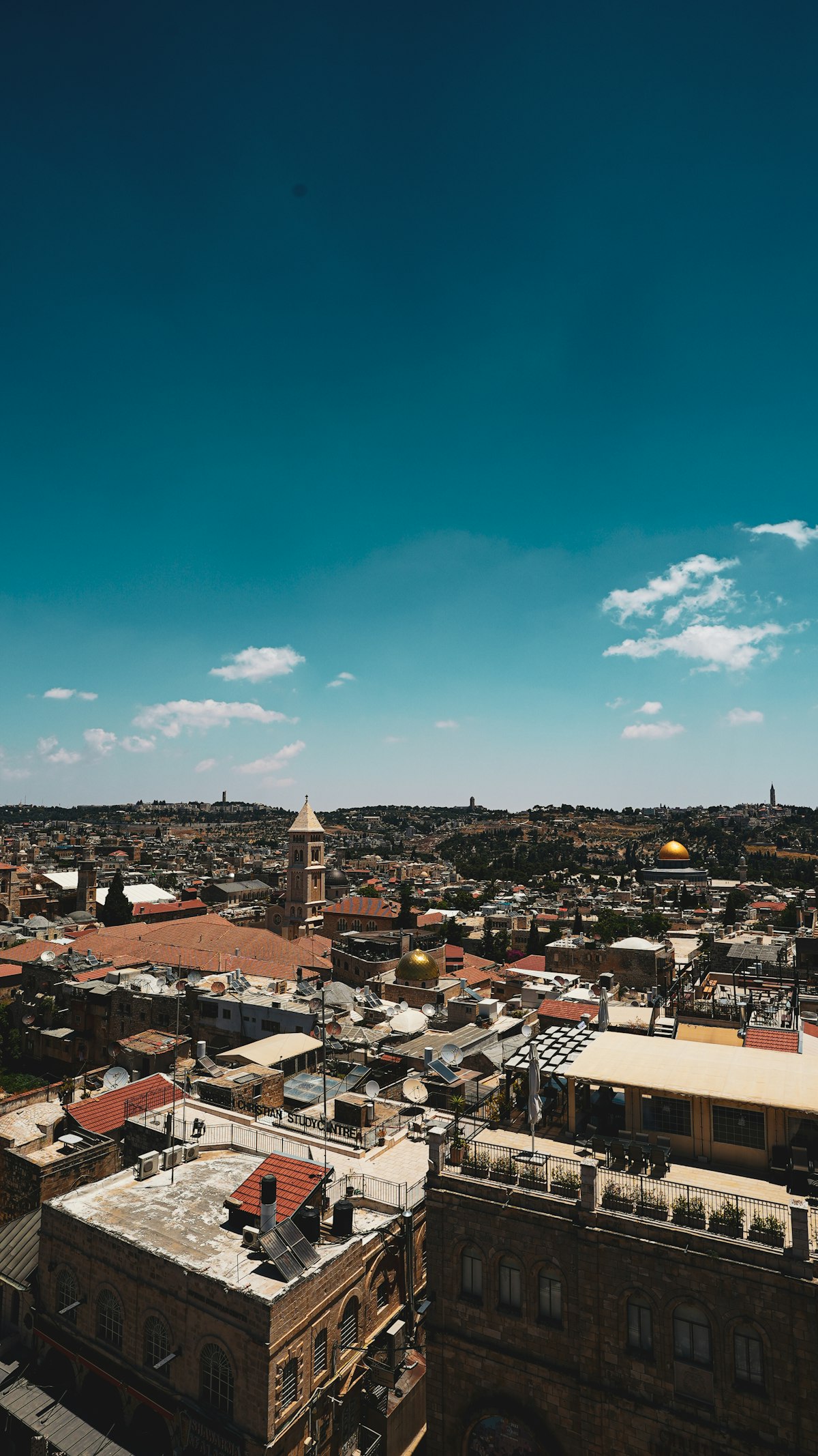 German Colony Jerusalem — a quiet residential street with trees and café terraces in the upscale southern neighbourhood