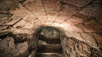 An atmospheric map of a medieval dungeon with intricate corridors and chambers.