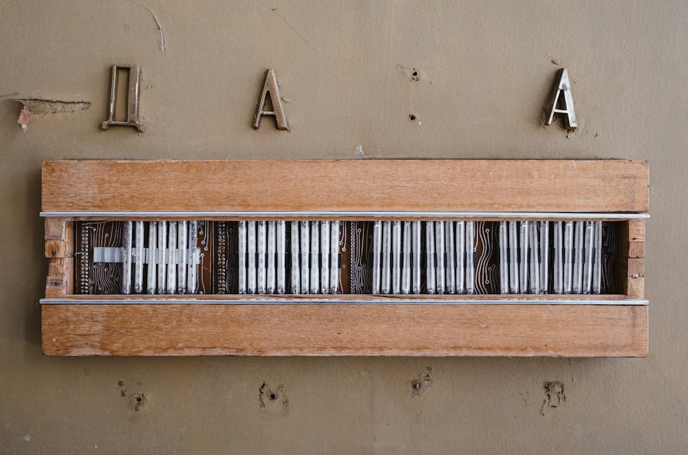 a wooden shelf with several books on it