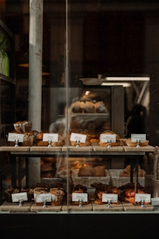 A cozy corner showing assorted bakery goods with warm lighting