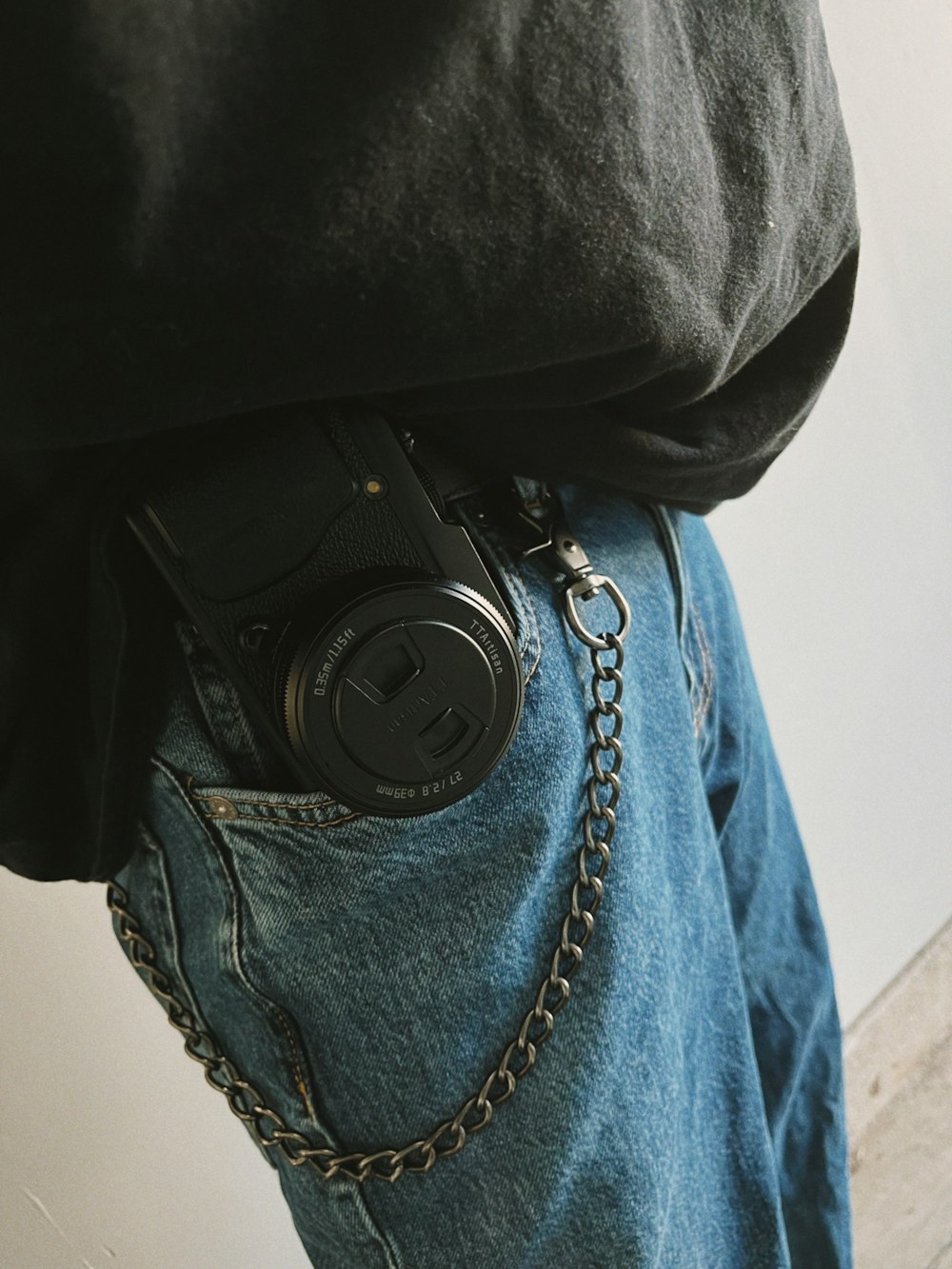 a person with a camera in their pocket