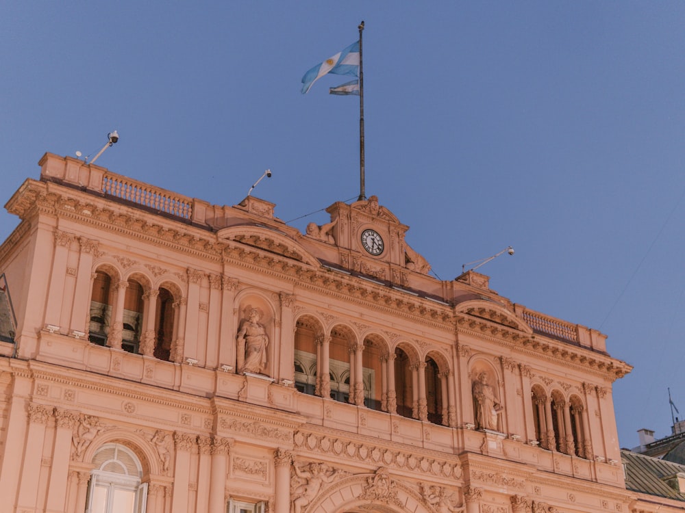 a building with a clock on the top of it