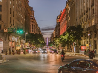 a city street filled with lots of traffic