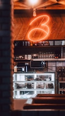 A cozy corner of the Chan Selvita store showing handcrafted organic chocolates and a warm coffee setup.