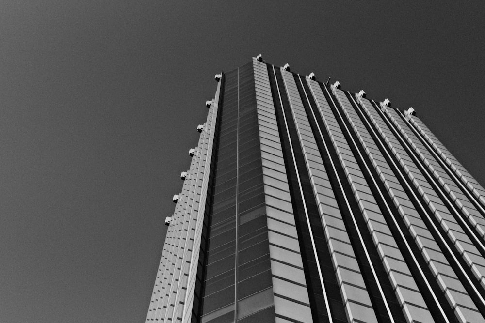 a black and white photo of a tall building