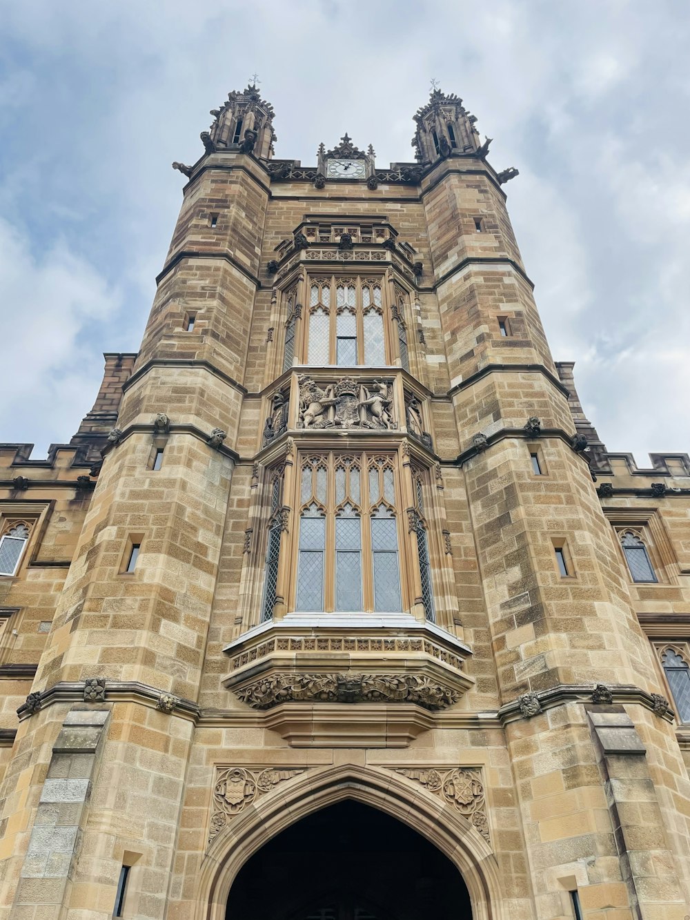 a tall building with a clock on the front of it