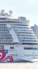 a large cruise ship in a body of water