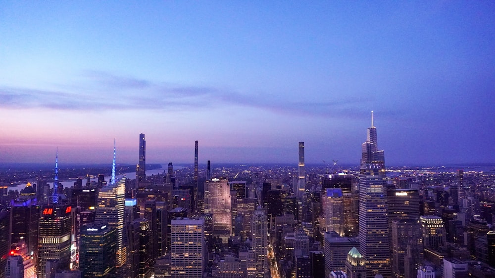 a view of a city at night from the top of a building