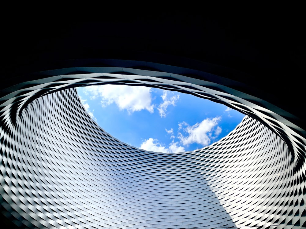 a view of the sky through a circular window