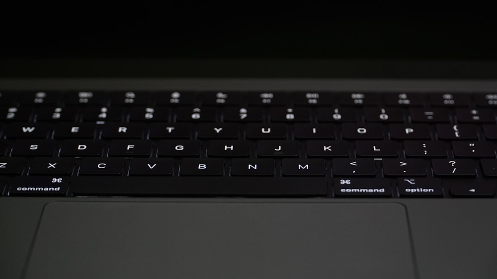 a close up of a black keyboard on a laptop