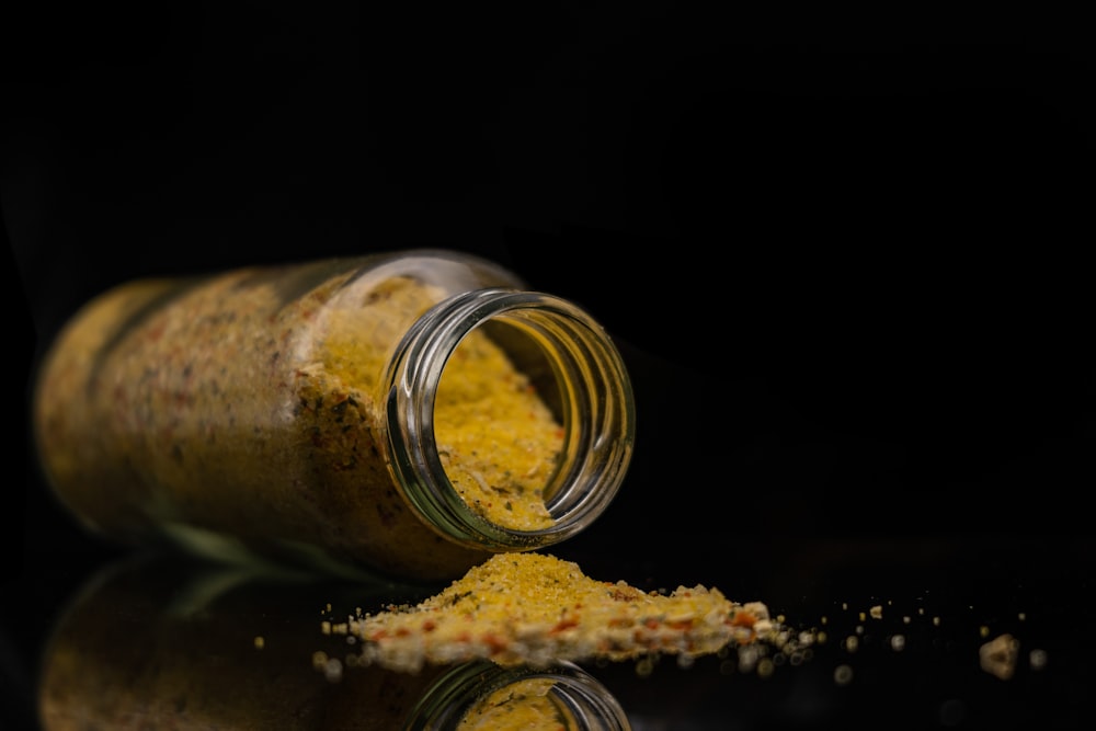 a close up of a jar filled with food