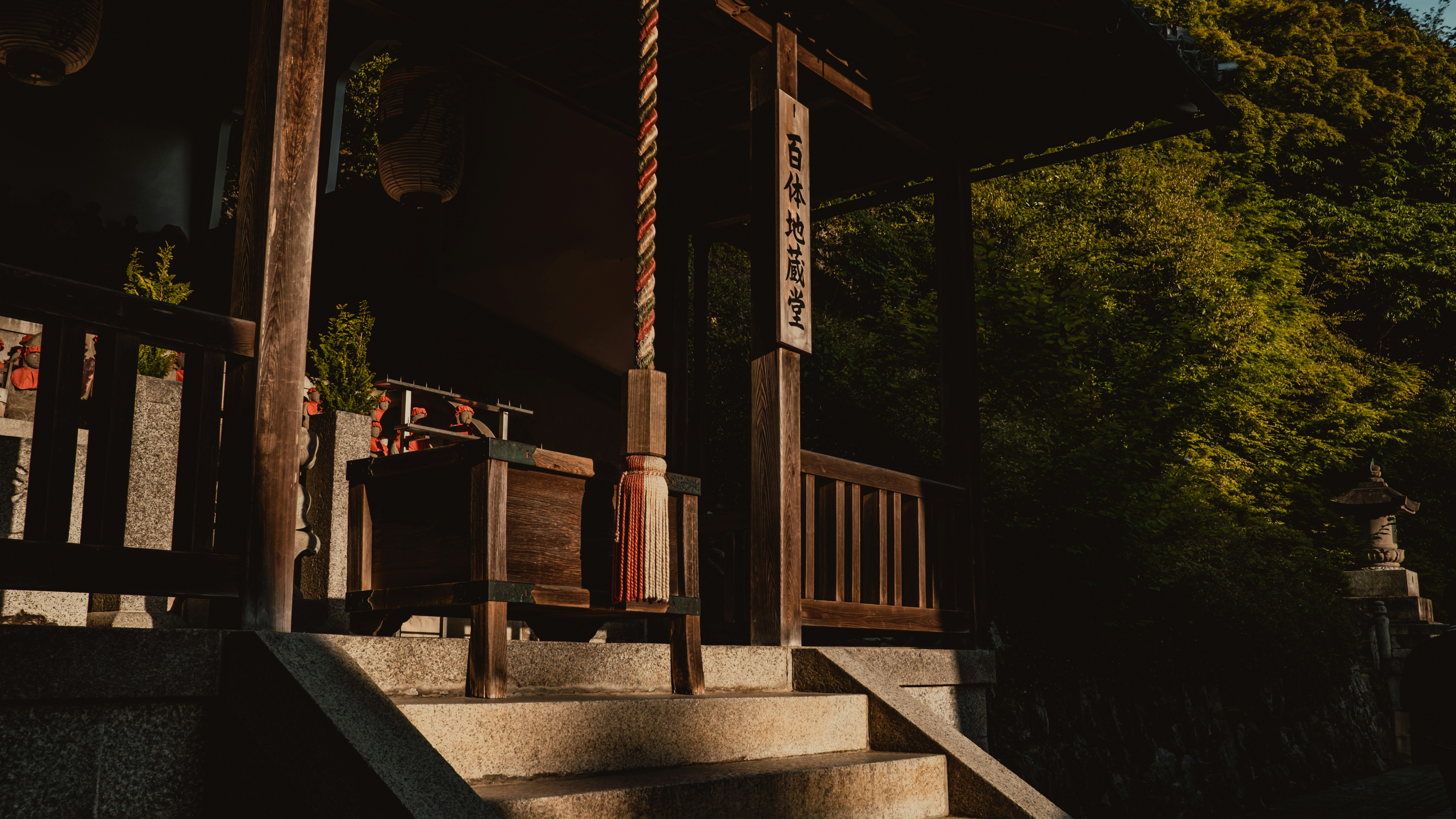 a tall wooden structure sitting on top of a set of stairs