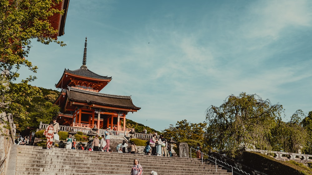 a group of people walking up and down some steps