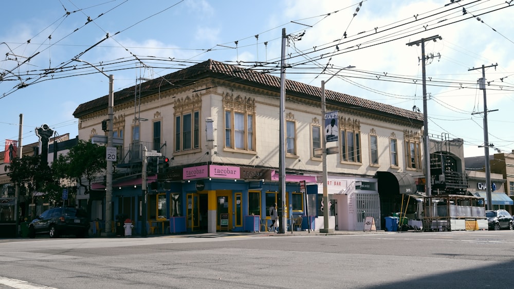 a street corner with a building on the corner