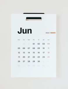 A minimalist calendar page marked with a bold red circle on the launch date.