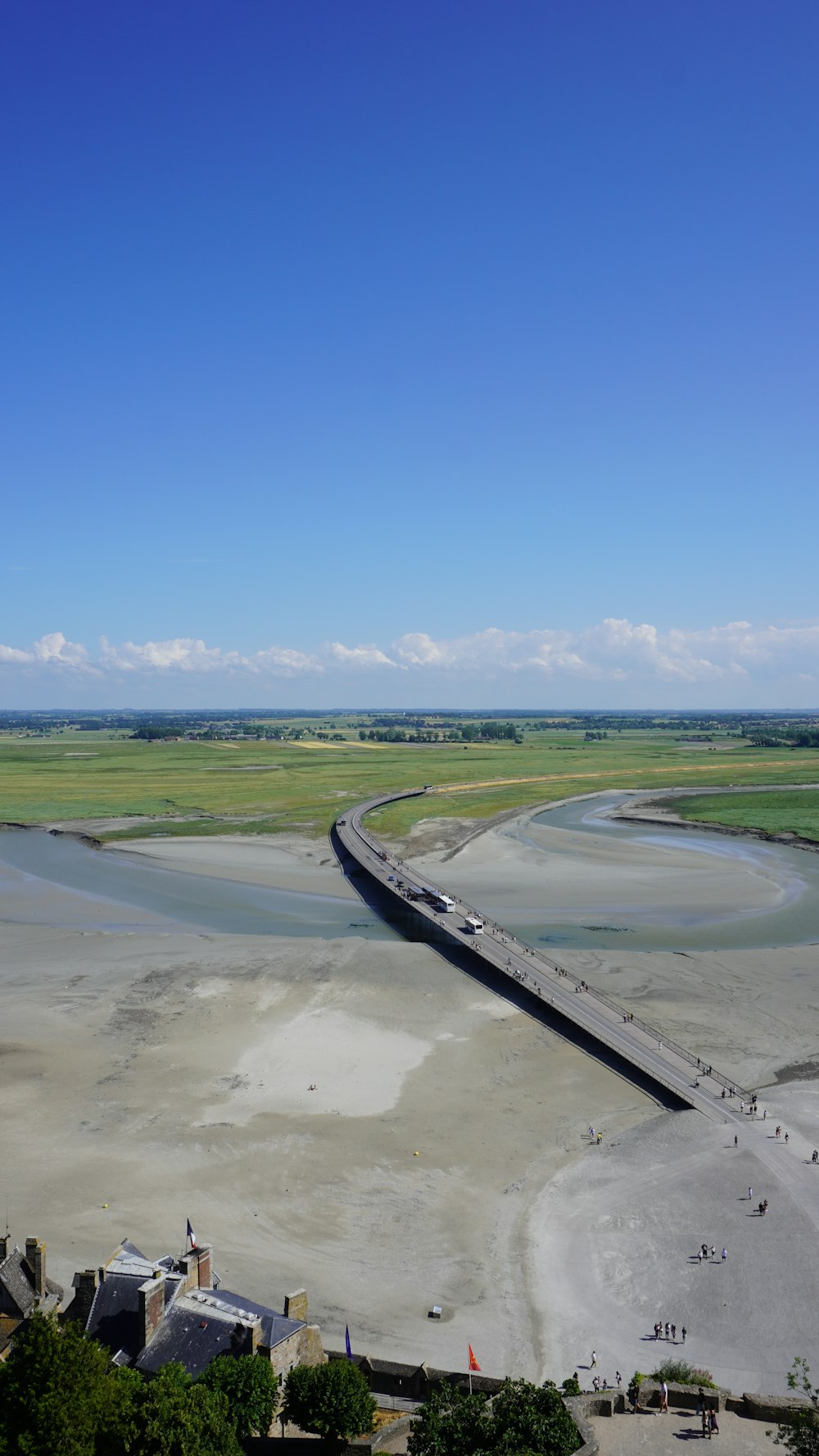 a view of a bridge over a body of water