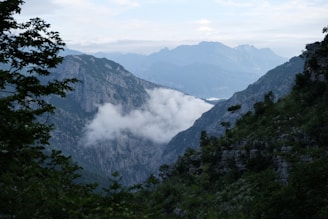 A picturesque scene of Ravana's Cave nestled in the mountains.