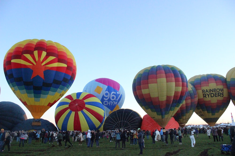 a large group of hot air balloons in the sky