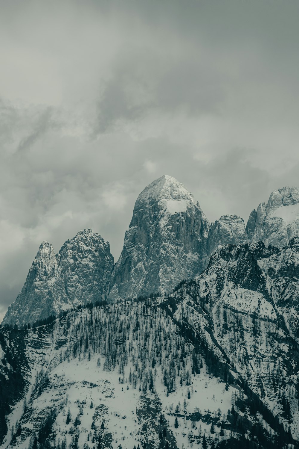 a black and white photo of a mountain range