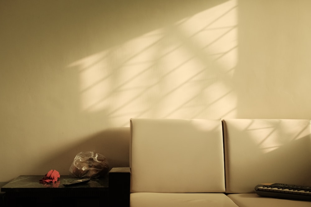 a living room with a couch and a table