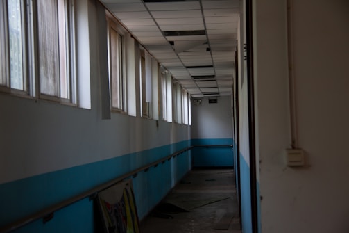 Team members inspecting water damage in a commercial office space.