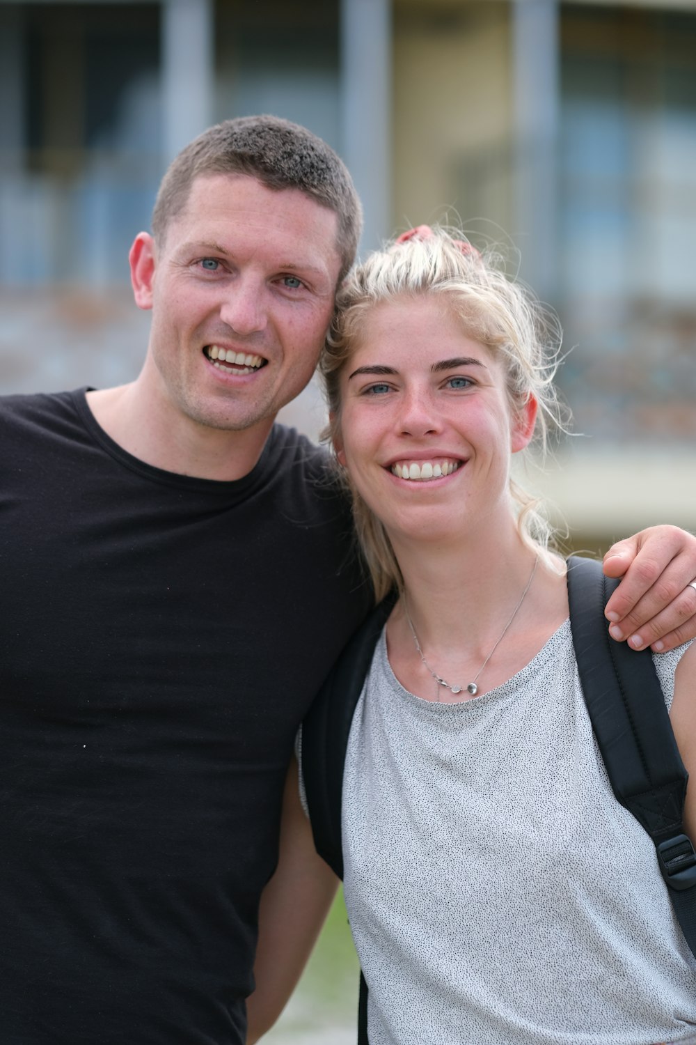 a man and a woman posing for a picture