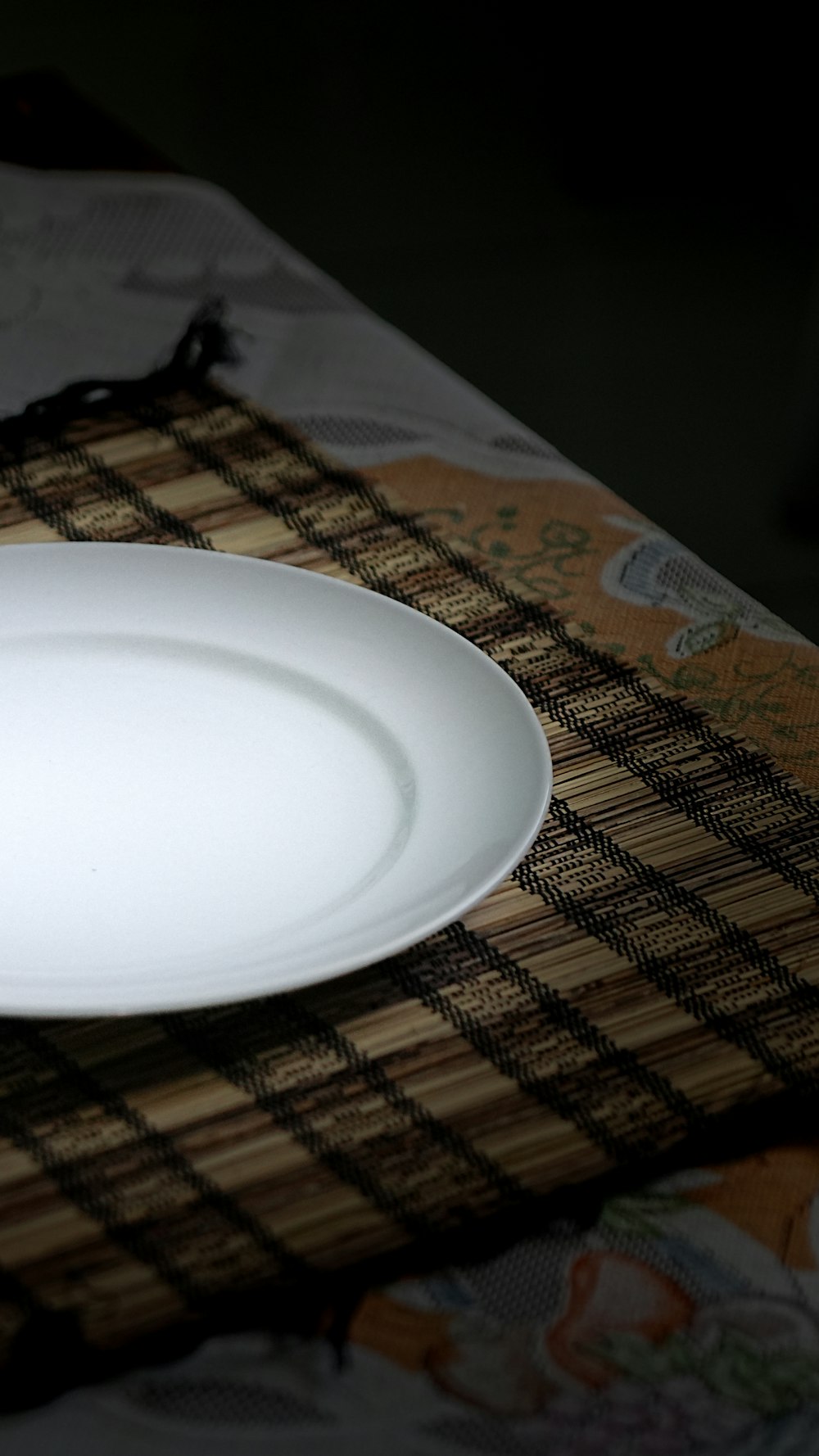 a white plate sitting on top of a table